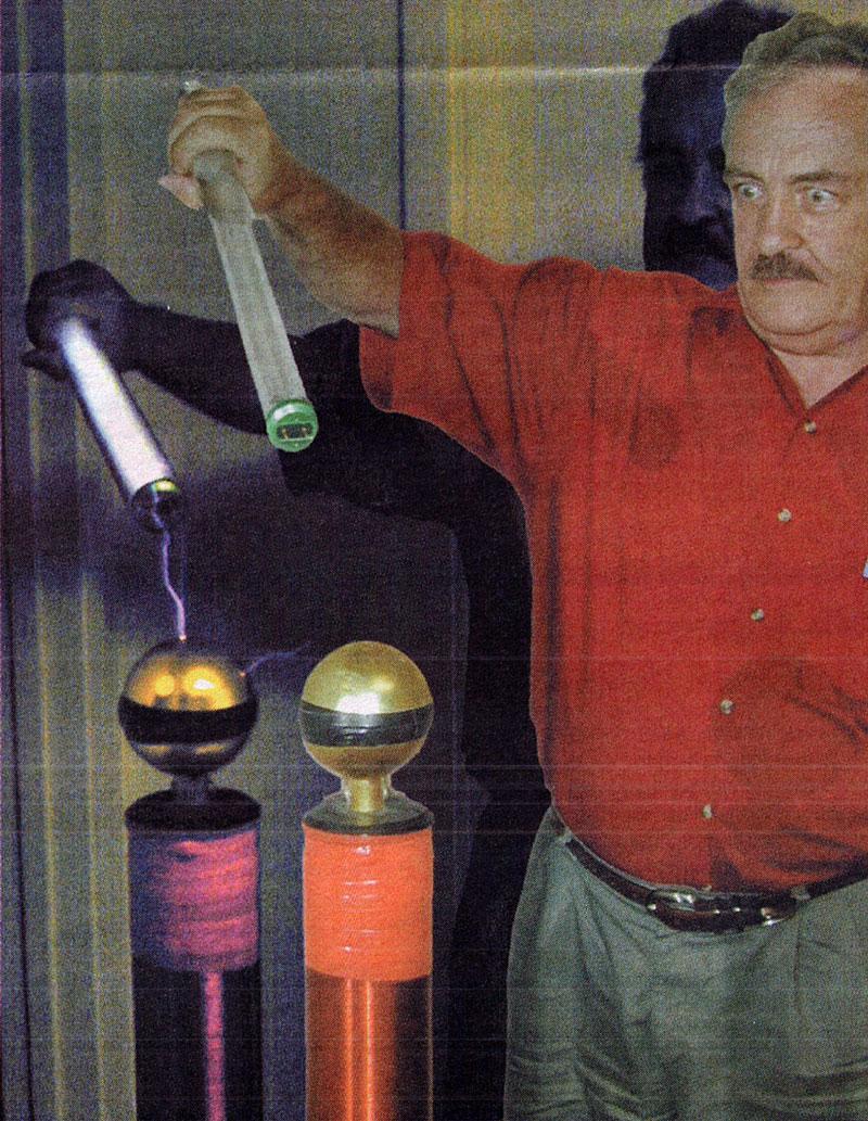 J.W. McGinnis demonstrating a mini Tesla coil