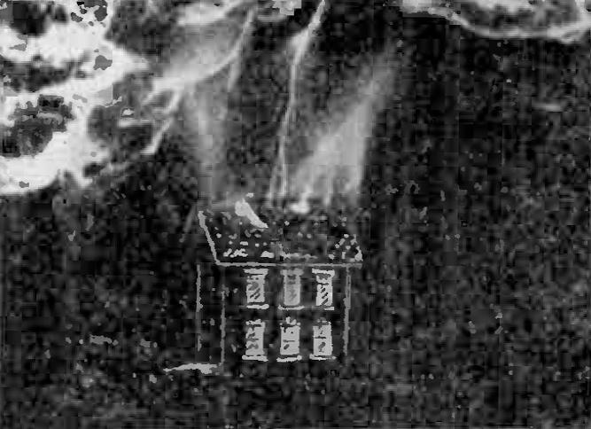 Model house without aerial protection exposed to Tesla coil discharges