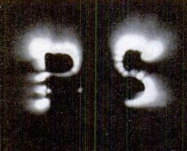 Discharges from metal letters "P" and "S" connected to a Tesla Coil