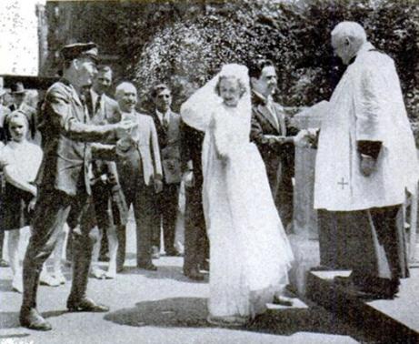 Telegraph boy throwing rice at a wedding