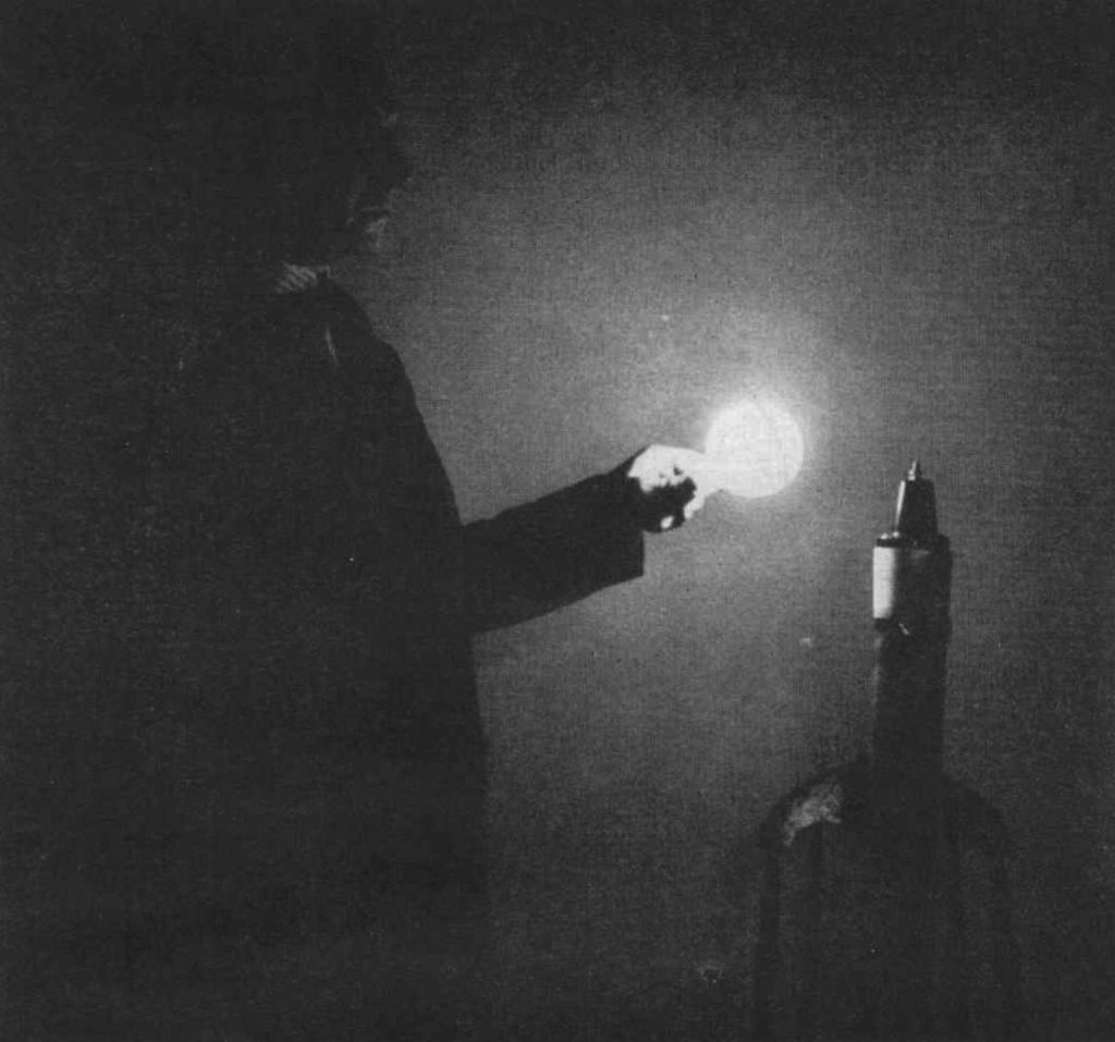 Incandescent light bulb brought near Tesla coil.