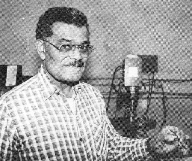 Franklin Macon holding up a small Tesla Turbine rotor