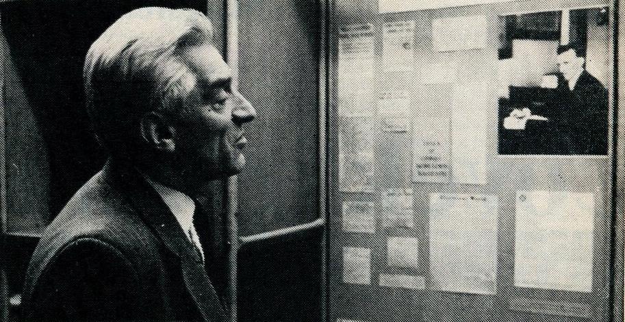Dr. Aleksandar Marinčić looking at display in the Nikola Tesla Museum