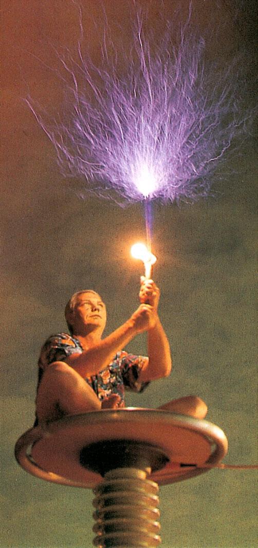 Legendary Tesla coil builder Bill Wysock passing high-voltage electricity through his body