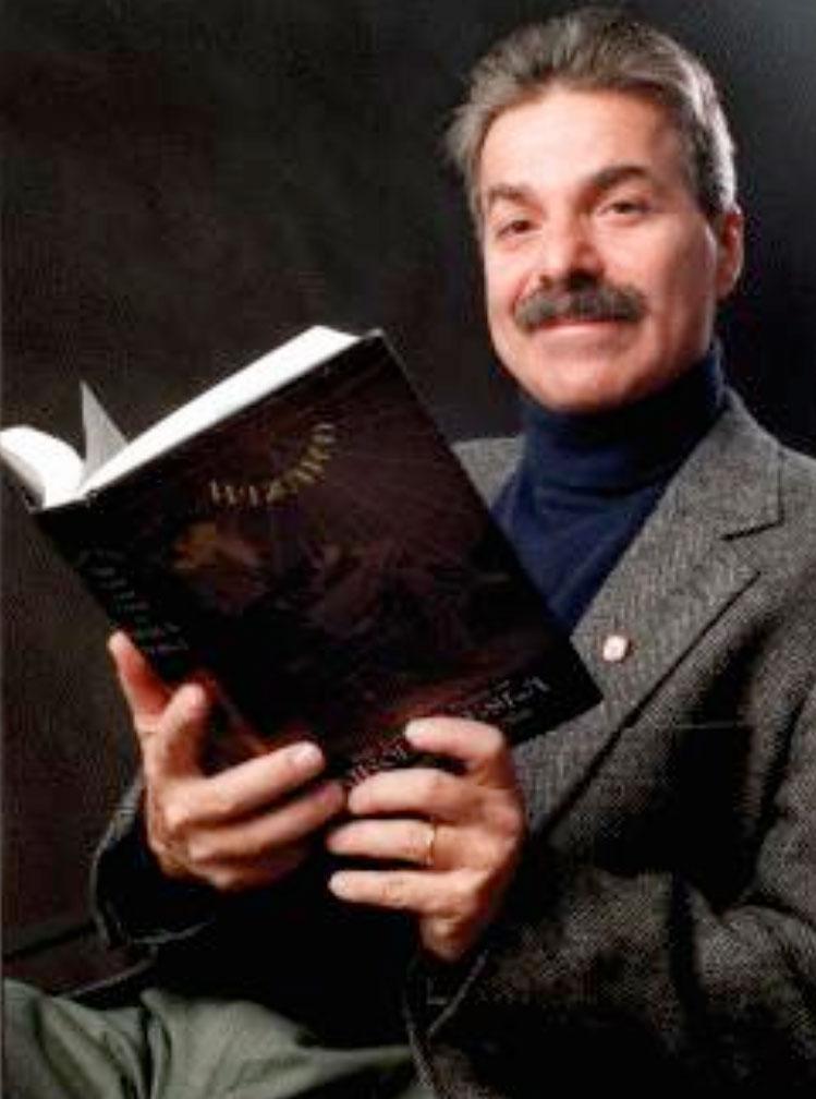 Marc J. Seifer with his book, "Wizard".