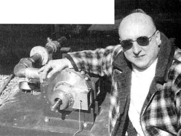 Frank Germano displays one of the numerous Tesla turbines