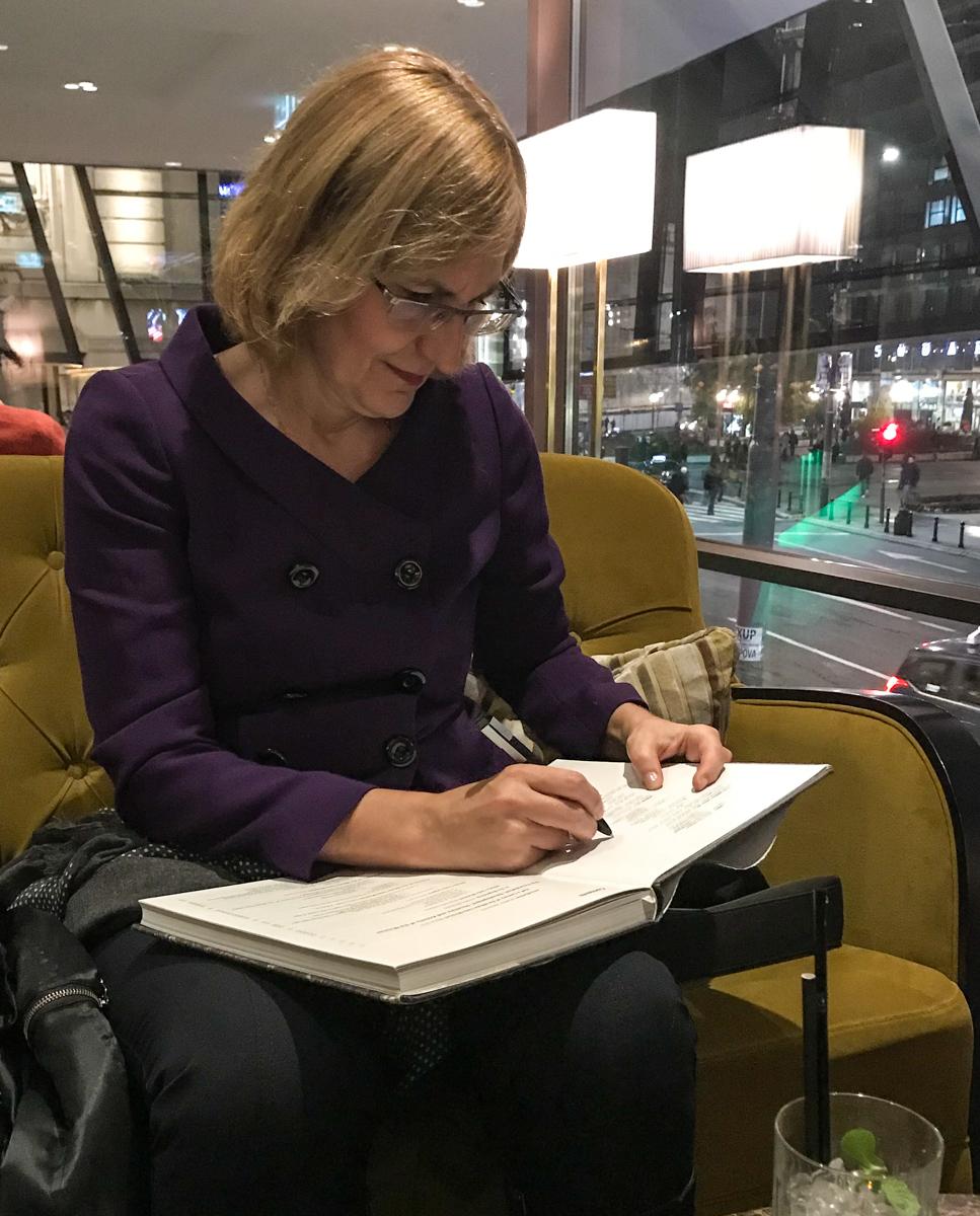 Zorica Civric signing her book written about the Tesla Museum in Belgrade