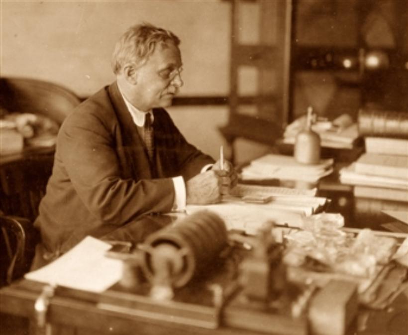 Elihu Thomson working at his desk