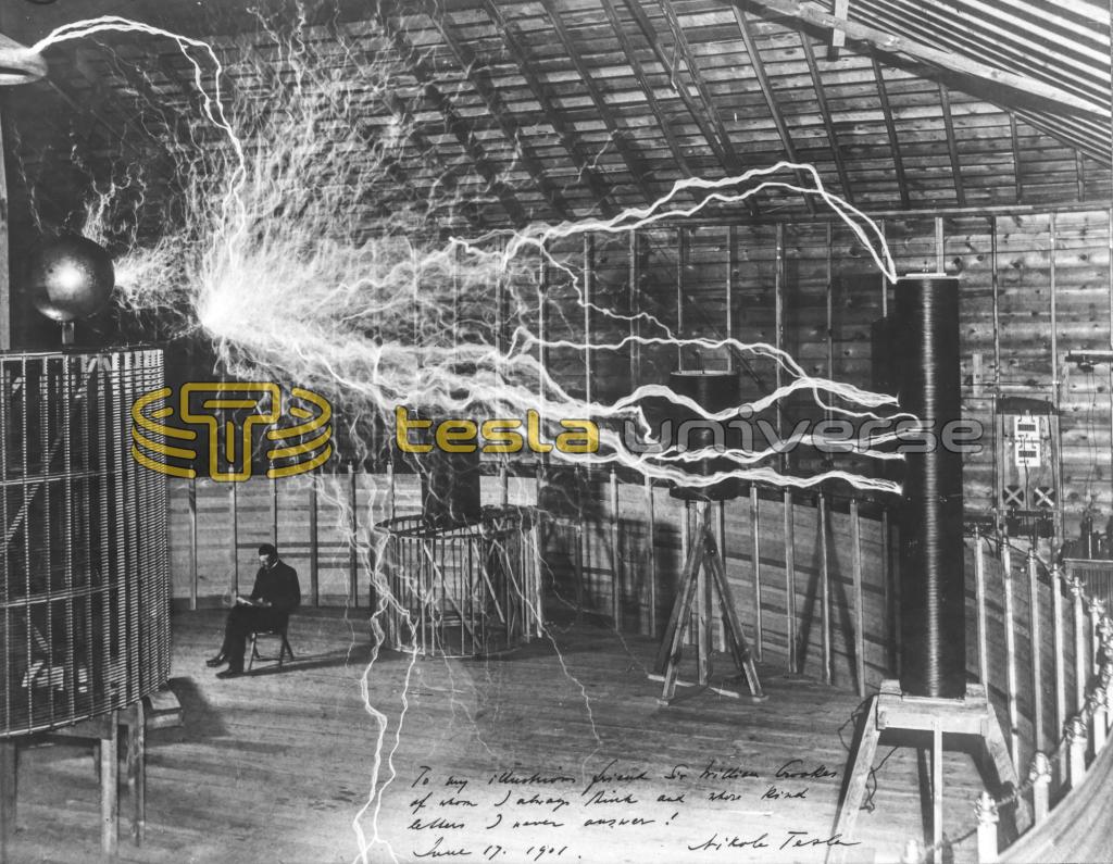 Nikola Tesla seated inside his Colorado Springs oscillator