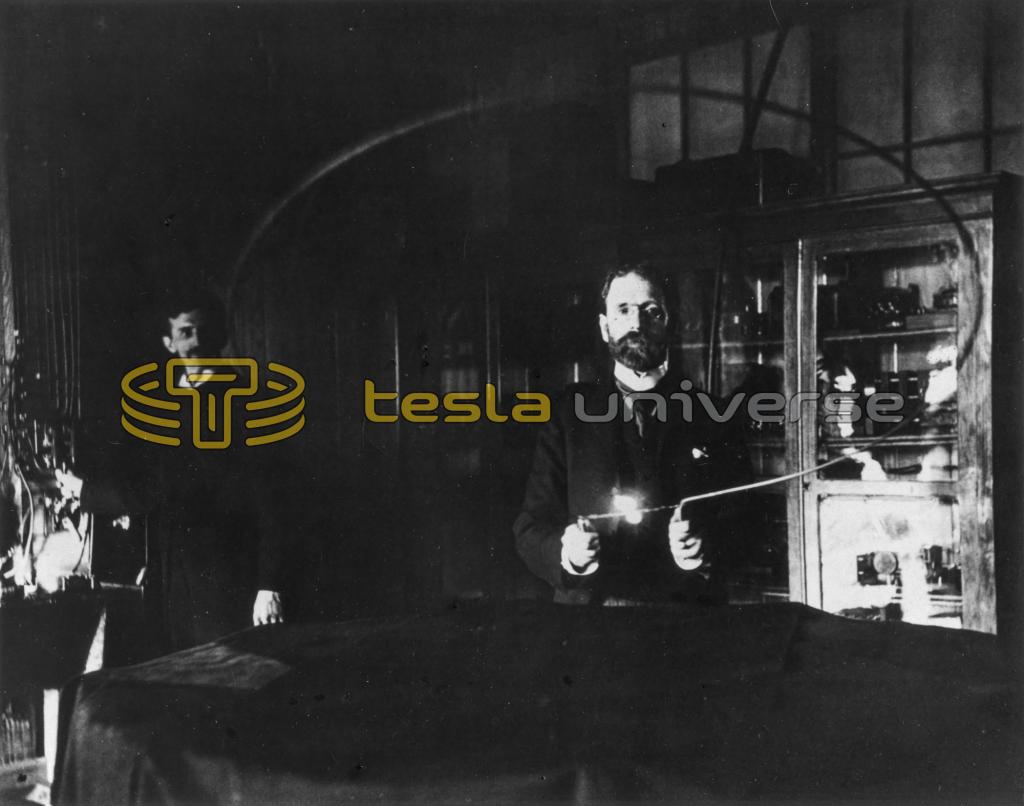 Robert Underwood Johnson assisting Nikola Tesla with an experiment