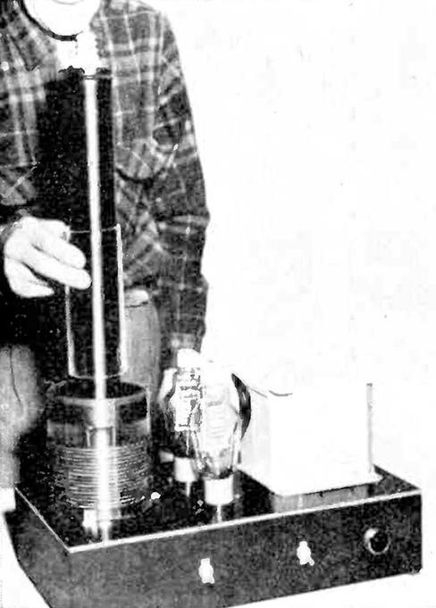 Installing the insulating tube of the New and Improved Tesla Coil