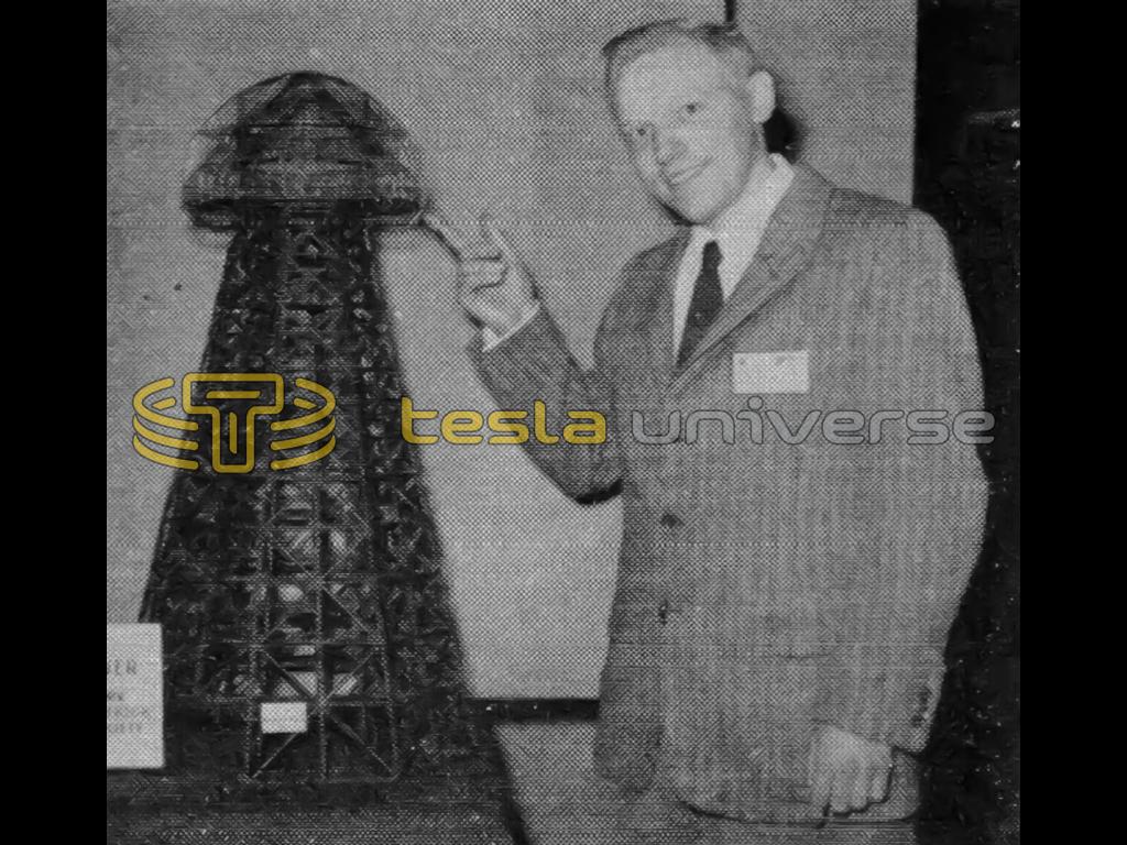 Leland I. Anderson with model of Tesla's Wardenclyffe tower.