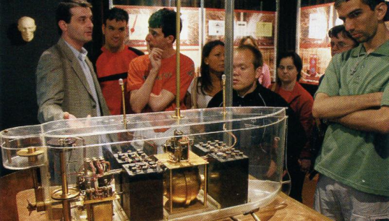 Students observing the model of Tesla's boat at the Nikola Tesla Museum