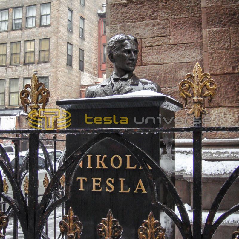 The Tesla statue at St. Sava Cathedral showing Tesla's name in gold