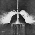Tesla Colorado Springs extra coil discharge issuing from two diametrically opposite wires