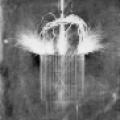 Sparks fly from multiple breakout points attached to Tesla's extra coil in his Colorado Springs lab