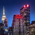 New Yorker Hotel building at night