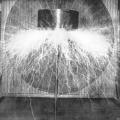 Tesla's magnifying transformer in action in his lab on Houston St.