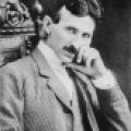 Famous portrait of Nikola Tesla seated in ornamental chair with hand to face
