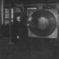 Nikola Tesla demonstrating wireless power transmission